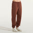 New Balance pantalone jogger tessuto ruggine