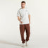 New Balance pantalone jogger tessuto ruggine